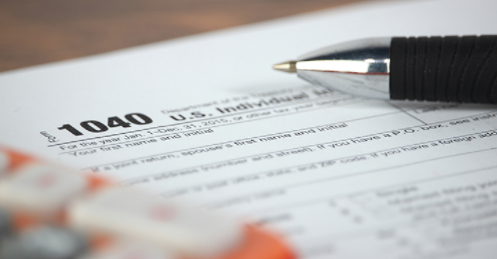 image of tax form for blog post Tax Season is Over—But The Scams Have Just Begun